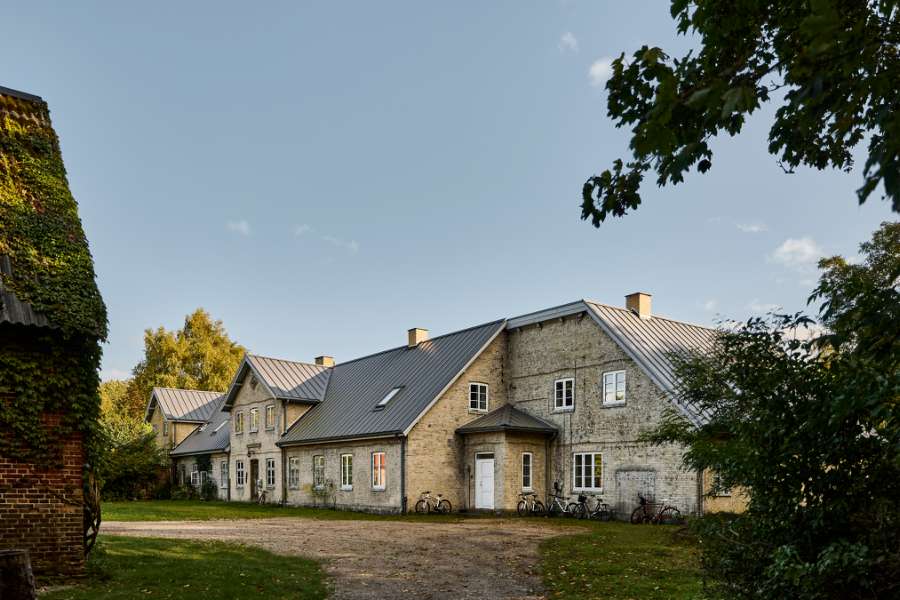 Zooming across the renovated Faxe manor with a new steel roof, Feddet 27, 4640 Faxe, Denmark